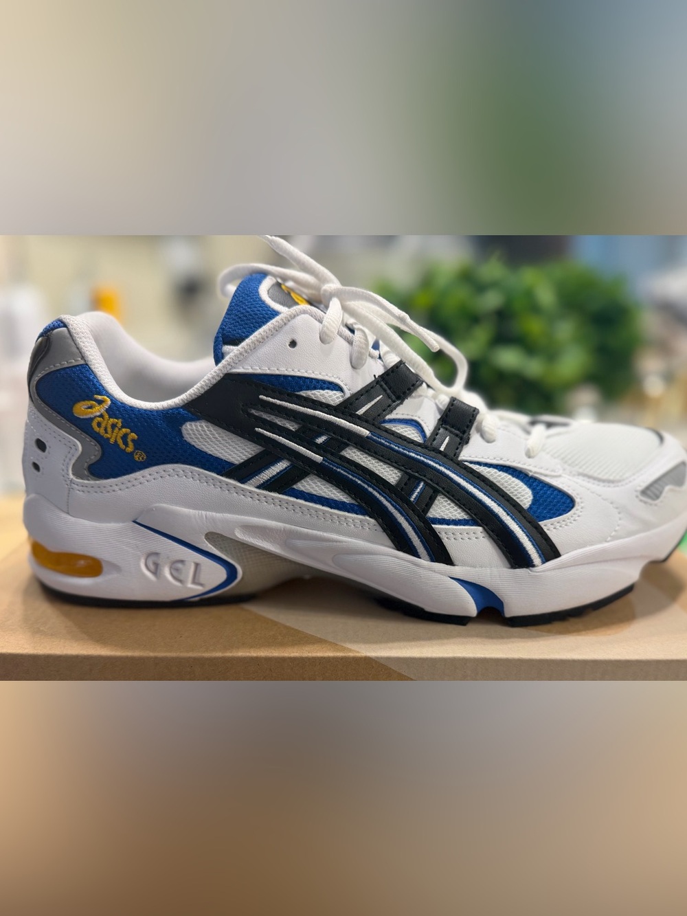 ASICS White Blue and Black Gel Cushion Sneakers with Yellow Accents